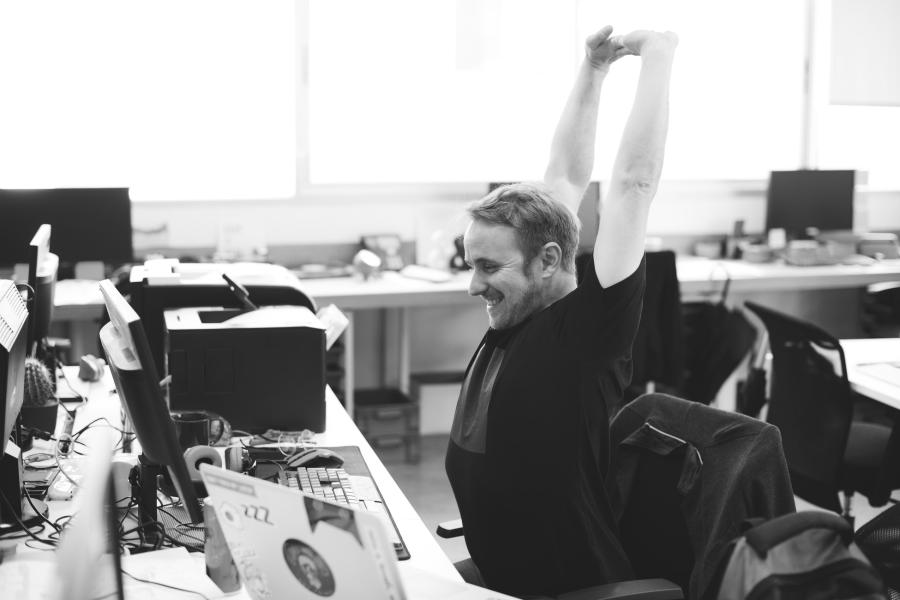 5 Desk Yoga Poses (That Won’t Get You Weird Looks)